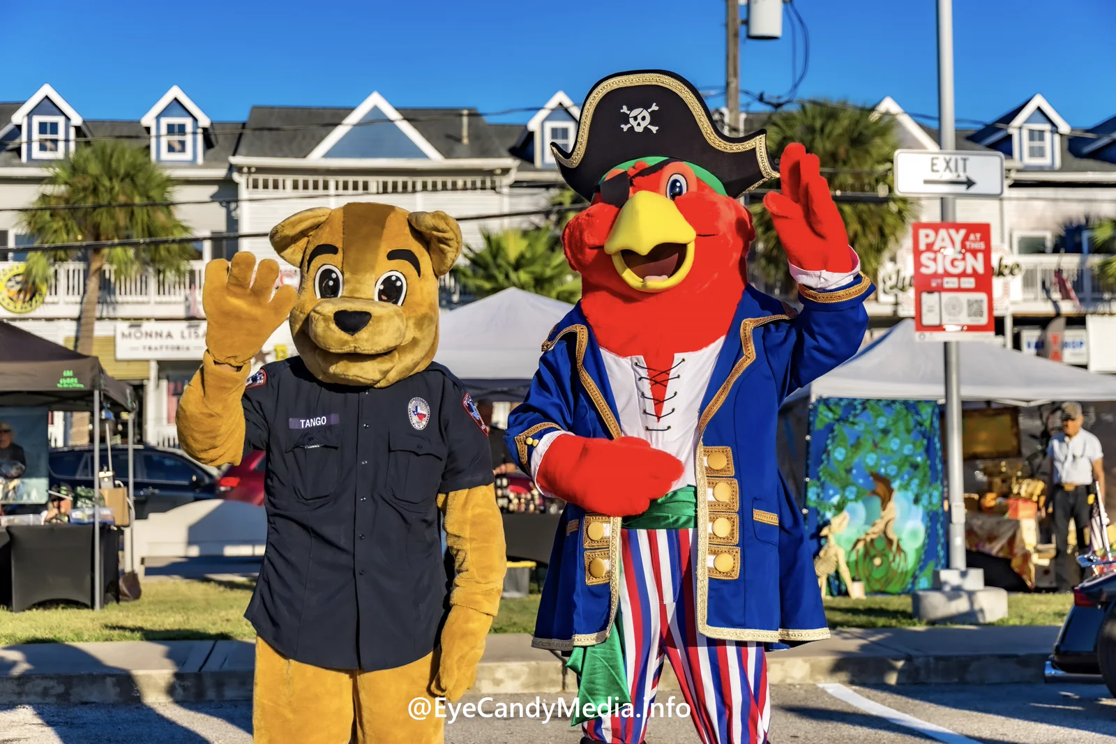 Families shopping vendor booths in Kemah